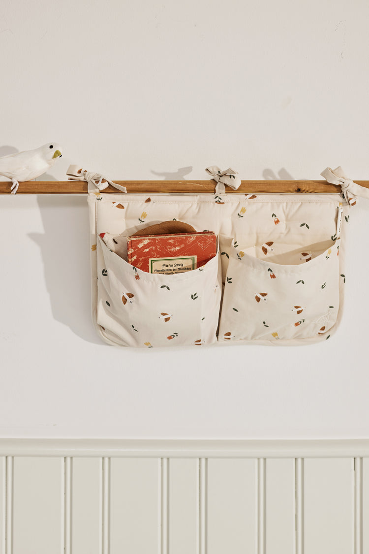 Tasca del letto Dear April, Uccelli canori