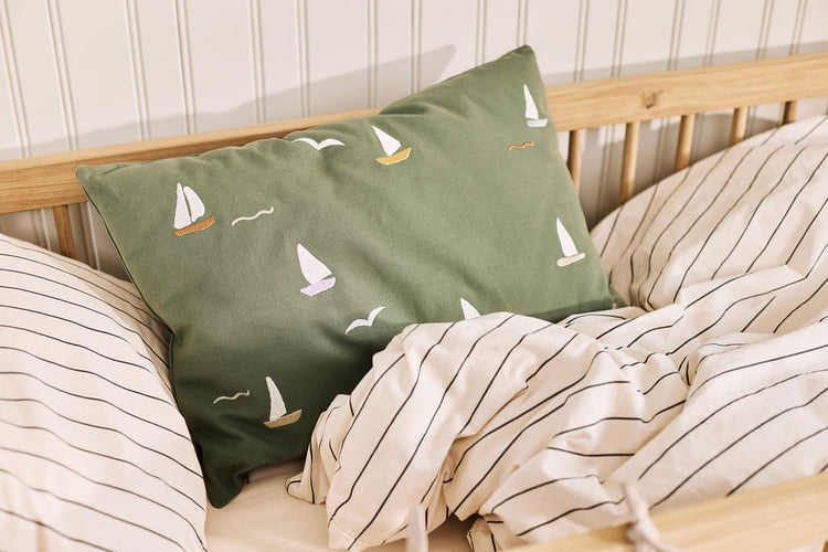 Embroidered cushion, sailboats